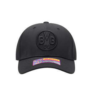 Front view of the Borussia Dortmund Dusk Adjustable hat with mid constructured crown, curved peak brim, and slider buckle closure, in Black.