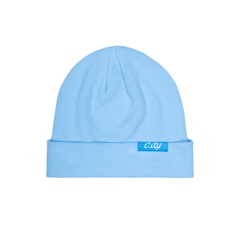 Manchester City 3000 ribbed beanie with team branded woven label on cuff, in Teal.