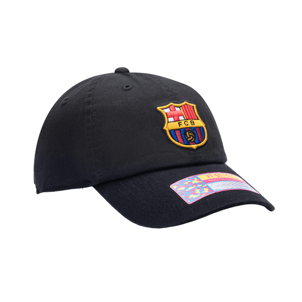 Side view of the FC Barcelona Bambo Kids Classic hat with low unstructured crown, curved peak brim, and buckle closure, in black.